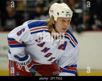 New York Rangers (6) Darius Kasparaitis chases Toronto Maple Leafs (28) Tie  Domi for the puck in the first period at Madison Square Garden in New York  City on March 18, 2006. (UPI Photo/John Angelillo Stock Photo - Alamy