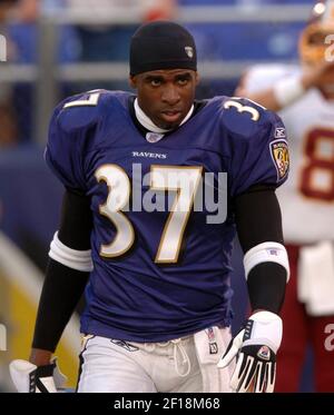 Baltimore Ravens cornerback Deion Sanders lines up against the