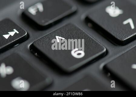 Le numéro 6 et la touche caret du clavier d'un ordinateur portable Banque D'Images