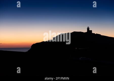 Phare Belle tout sur les South Downs, près d'Eastbourne dans East Sussex, Angleterre, Royaume-Uni à Sunset. Banque D'Images