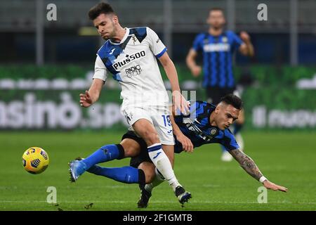 Milan, Italie. 08 mars 2021. Berat Djimsiti d'Atalanta BC et Lautaro Martinez du FC Internazionale se disputent le ballon lors du match de football de la série A entre le FC Internazionale et Atalanta BC au stade San Siro de Milan (Italie), le 14 février 2021. Photo image Sport/Insidefoto crédit: Insidefoto srl/Alamy Live News Banque D'Images