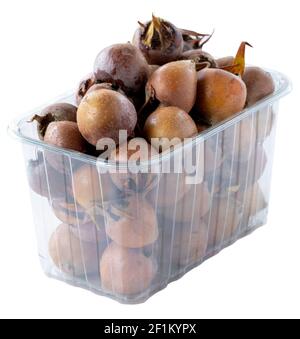 medlar isolé sur fond blanc Banque D'Images