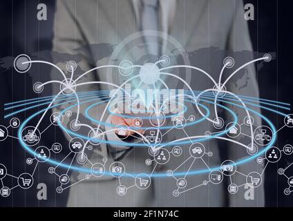 Réseau d'icônes numériques sur la carte du monde par rapport à la section médiane de l'homme d'affaires Banque D'Images