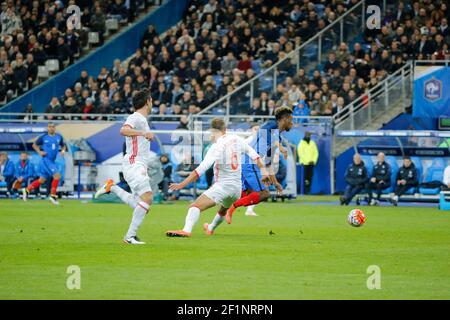 Kingsley Coman (Bayern Munich) (FRA), Aleksei Berezutski (CSKA Moscou) (RUS) lors du match international de football 2016 (football) entre la France et la Russie le 29 mars 2016 au Stade de France à Saint Denis, France - photo Stephane Allaman / DPPI Banque D'Images