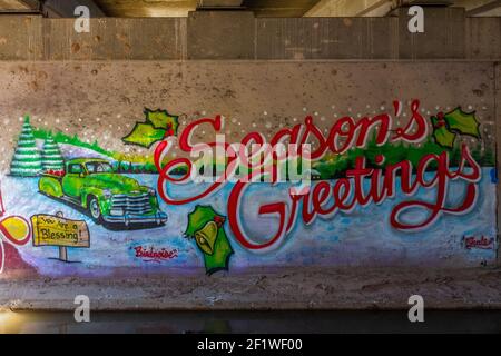 « Season's Greetings », graffiti sous le pont-pont de Bridge Boulevard à Albuquerque, Nouveau-Mexique attribué à Cyrus Moses alias « Birdnoise » Banque D'Images