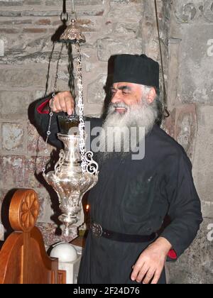 Monk dans l'Église du Saint-Sépulcre à Jérusalem Banque D'Images