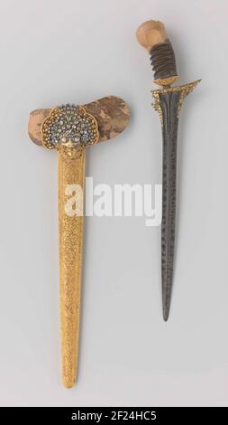 Kris du roi William I.ce kris a été présenté au roi Guillaume I par le sultan de Madura, Cakra Adinigrat VIII, en 1835. Dans une lettre d'accompagnement, le sultan a exprimé mille remerciements pour sa nomination comme commandant dans l'ordre du Lion hollandais. Son don au roi était un kris ‘Made at my kraton [= Palace]’. Deux des 117 diamants décorant le fourreau sont manquants. Banque D'Images