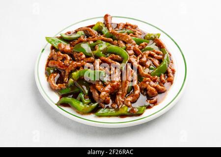 Gros plan de bœuf de style chinois avec poivrons verts Banque D'Images