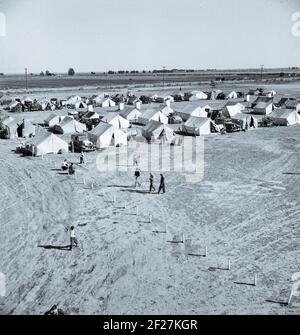 Administration de la sécurité agricole (FSA) camp de travail migratoire. Calipatria, Imperial Valley, Californie . Février 1936. Photo de Dorothea Lange Banque D'Images