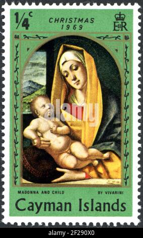 ÎLES CAÏMANS - VERS 1969: Un timbre imprimé dans les îles Caïmans, numéro de Noël, a montré la peinture d'Alvit Vivarini - la Vierge et l'enfant (1483), Banque D'Images
