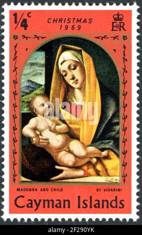 ÎLES CAÏMANS - VERS 1969: Un timbre imprimé dans les îles Caïmans, numéro de Noël, a montré la peinture d'Alvit Vivarini - la Vierge et l'enfant (1483), Banque D'Images