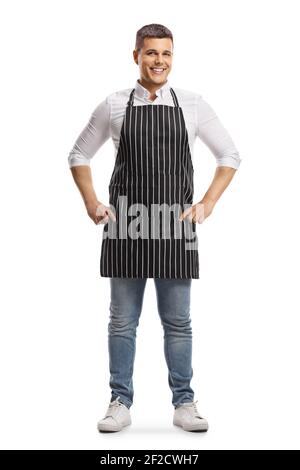 Portrait en longueur d'un beau homme portant un tablier isolé sur fond blanc Banque D'Images