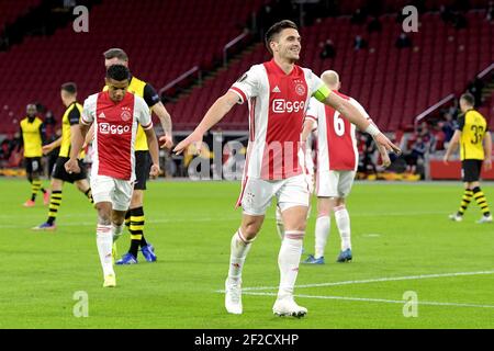 AMSTERDAM , PAYS-BAS - MARS 11: Célébrez Dusan Tadic d'Ajax pendant l'Ajax / BSC jeunes garçons - UEFA Europa League Round de 16 Leg One Match entre Ajax et jeunes garçons à Johan Cruijff Arena le 11 mars 2021 à Amsterdam (pays-Bas) (photo de Gerrit van Keulen/Orange Pictures) crédit : Orange pics BV/Alay Live News Banque D'Images