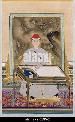 Portrait de l'empereur Kangxi en robe informelle tenant une brosse. Banque D'Images