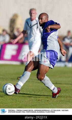 FOOTBALL - JEUX AMICAUX 2007/05 - GIRONDINS BORDEAUX / FC TOULOUSE - 14/07/2004 - STEPHANE DALMAT (TOU) - PHOTO MANUEL BLONDAU / TOUCHE FLASH Banque D'Images