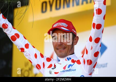 Joaquim Rodriguez de l'Espagne à cheval pour l'équipe Katusha célèbre son maillot à pois sur le podium pendant le Tour de France, UCI World Tour 2014, Stage 11, Besançon - Oyonnax (187,5 km), le 16 juillet 2014 - photo Manuel Blondeau / AOP Press / DPPI Banque D'Images