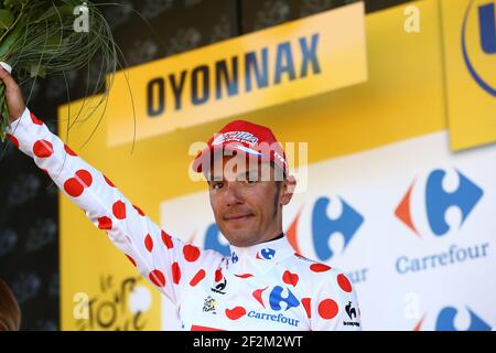 Joaquim Rodriguez de l'Espagne à cheval pour l'équipe Katusha célèbre son maillot à pois sur le podium pendant le Tour de France, UCI World Tour 2014, Stage 11, Besançon - Oyonnax (187,5 km), le 16 juillet 2014 - photo Manuel Blondeau / AOP Press / DPPI Banque D'Images