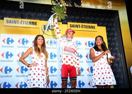 Joaquim Rodriguez de l'Espagne à cheval pour l'équipe Katusha célèbre son maillot à pois sur le podium pendant le Tour de France, UCI World Tour 2014, Stage 12, Bourg-en-Bresse - Saint-Etienne (185,5 km), le 17 juillet 2014 - photo Manuel Blondeau / AOP Press / DPPI Banque D'Images