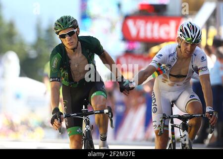 Pierre Rolland de France à cheval pour l'équipe Europcar (L) et Rui Costa du Portugal à cheval pour Lampre-Merida réagissent en franchgeant la ligne d'arrivée pendant le Tour de France, UCI World Tour 2014, Stage 13, Saint-Etienne - Chamrousse (197,5 km), le 18 juillet, 2014 - photo Manuel Blondau / AOP Press / DPPI Banque D'Images