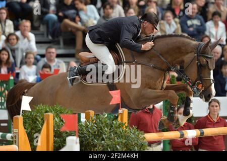 Jerome Hurel à cheval sur Urano (FRA) - Prix GL Evénements - pendant les Saut Hermes au Grand Palais de Paris, France, les 14 et 16 mars 2014. Photo Christophe Bricot / DPPI Banque D'Images