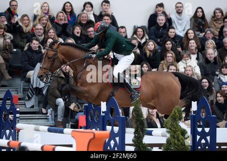 Abdelkebir OUADDAR monte rapidement de Kreisker pendant le Grand Prix des Saut-Hermès , Grand-Palais, le 20 mars 2016, à Paris, France - photo Christophe Bricot / DPPI Banque D'Images
