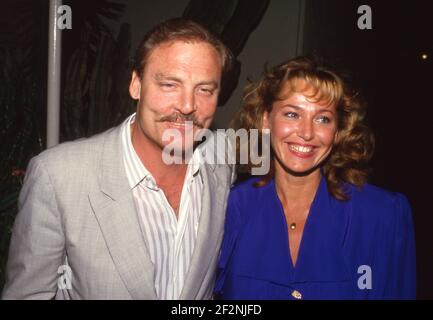 Stacy Keach et Malgosia Tomassi 1988 crédit: Ralph Dominguez/MediaPunch Banque D'Images