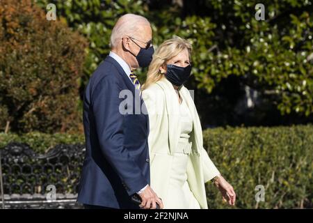 Washington, États-Unis. 12 mars 2021. Le président Joe Biden et la première dame Jill Biden quittent la Maison-Blanche pour un week-end à Wilmington, Delaware, à Washington DC, le vendredi 12 mars 2021. Photo de Jim Lo Scalzo/UPI crédit: UPI/Alay Live News Banque D'Images