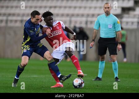 Reims, Marne, France. 12 mars 2021. Milieu de terrain DE Reims MARSHALL MUNETSI en action pendant le championnat français de football Ligue 1 Uber mange le Stade de Reims contre l'Olympique Lyonnais au stade Auguste Delaune - Reims.jeu 1:1 crédit: Pierre Stevenin/ZUMA Wire/Alamy Live News Banque D'Images