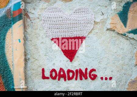 Le coeur de laine qui est chargement est symbolise le vide qui a une fin en vue. C'est le travail du designer Ivona Martinic et il se réfère à Banque D'Images