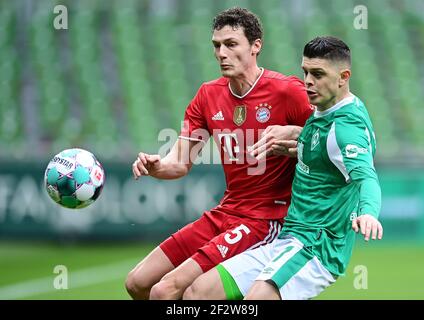 Ville de Brême, Allemagne. Firo 2021: 13.03.2021 Soccer, 1er Bundesliga, saison 2020/2021, SV Werder Bremen SVW - FCB FC Bayern Munich Muenchen de gauche à droite Benjamin Pavard (Bayern), Milot Rasica crédit: Tim Groothuis/Witters/via firosportphoto | usage dans le monde entier/dpa/Alay Live News Banque D'Images