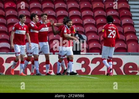 Stade Riverside, Middlesbrough, Cleveland, Royaume-Uni. 13 mars 2021. Championnat de football de la Ligue anglaise de football, Middlesbrough versus Stoke City; Grant Hall of Middlesbrough célèbre le score du premier but de Middlesbroughs dans la 20e minute crédit: Action plus Sports/Alamy Live News Banque D'Images