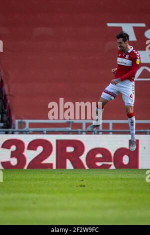 Stade Riverside, Middlesbrough, Cleveland, Royaume-Uni. 13 mars 2021. Championnat de football de la Ligue anglaise de football, Middlesbrough versus Stoke City; Grant Hall of Middlesbrough célèbre le score du premier but de Middlesbroughs dans la 20e minute crédit: Action plus Sports/Alamy Live News Banque D'Images