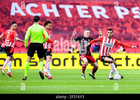 EINDHOVEN, PAYS-BAS - MARS 14: Jens Toornstra de Feyenoord Rotterdam, Cody Gakpo de PSV pendant le match néerlandais Eredivisie entre PSV et Feyenoor Banque D'Images