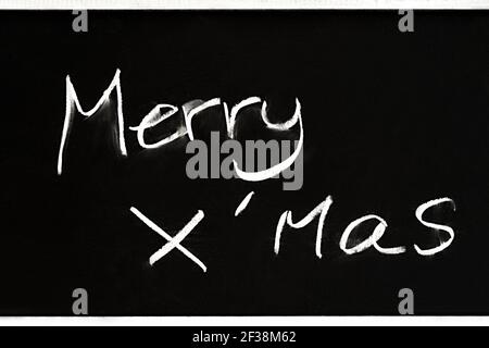 Merry x'ms manuscrite sur tableau noir Banque D'Images