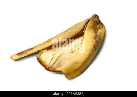 Pelure de banane sur fond blanc Banque D'Images