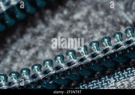 vêtements à fermeture éclair bleue gros plan, photographie macro Banque D'Images