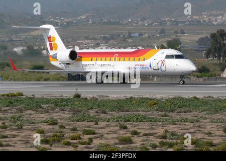 Bombardier CRJ-200 (EC-JEF) Iberia Regional - Air Nostrum prêt à décollage, Malaga, Espagne. Banque D'Images