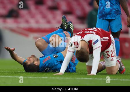 Stade Emirates, Londres, Royaume-Uni. 18 mars 2021. UEFA Europa League football, Arsenal versus Olympiacos; Sokratis Papastathopoulos de Olympiakos tombe lésé crédit: Action plus Sports/Alamy Live News Banque D'Images