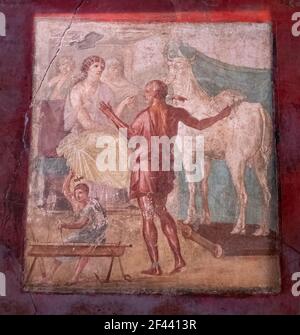 NAPLES, ITALIE- JUIN 13, 2019: NAPLES, ITALIE- JUIN, 13, 2019 : fresque de daedalus et pasiphae dans la maison des vettii à pompéi Banque D'Images
