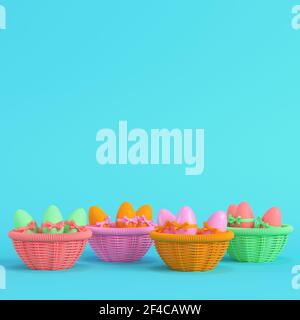Œufs de pâques colorés avec noeud dans un panier en osier sur fond bleu vif dans des couleurs pastel. Concept de minimalisme. rendu 3d Banque D'Images