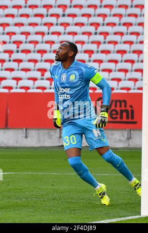 Nice, France. 20 mars 2021. Steve Mandanda lors du match Nice contre Marseille à la Ligue 1 Uber Eats le 20 mars 2021 à Nice, France. (Photo de Lionel Urman/Sipa USA) crédit: SIPA USA/Alay Live News Banque D'Images