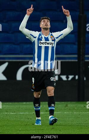 Cornella, Espagne. 20 mars 2021. Javi Puado d'Espanyol célèbre ses scores lors d'un match de football espagnol de deuxième division entre le RCD Espanyol et UD Logrones à Cornella, en Espagne, le 20 mars 2021. Crédit : Joan Gosa/Xinhua/Alay Live News Banque D'Images