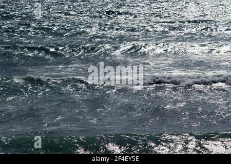 Photographie pour le matériel de fond de la mer qui brille dans la lumière du soleil Banque D'Images