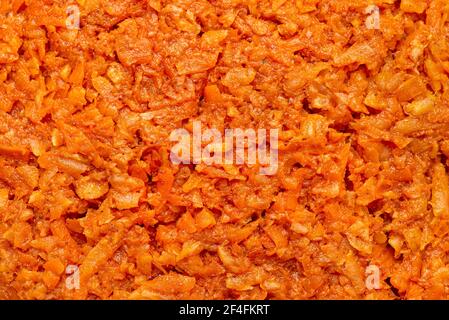 Arrière-plan fait à partir d'un gros plan d'une salade de carottes, macro prise de vue de dessus. Banque D'Images