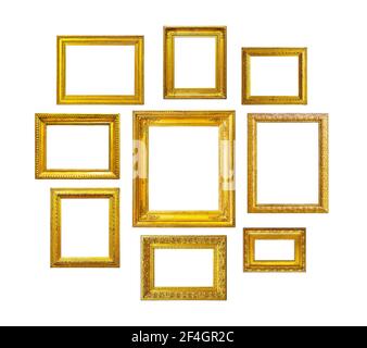 Cadres vintage dorés sur fond blanc. Ensemble de cadres dorés pour peintures, miroirs ou photos isolés sur fond blanc. Banque D'Images