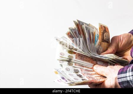 personne comptant de l'argent comptant grand montant d'argent comptant pas de visage Banque D'Images
