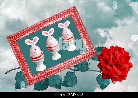 Oeufs de Pâques avec oreilles de lapin et muzzles encadrés contre le ciel. Concept de Pâques Banque D'Images