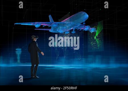 Homme d'affaires avec casque VR regardant le décollage holographique d'un avion Banque D'Images