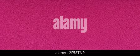 Texture pleine trame en cuir magenta propre. Haute résolution. Arrière-plan de macro de gros plan en similicuir rouge vide Banque D'Images