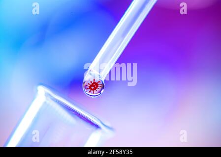 Modèle de virus dans une goutte de liquide. Recherche sur le coronavirus. Vaccin contre le coronavirus. Pipette chimique avec une goutte de liquide et un tube à essai sur fond bleu Banque D'Images